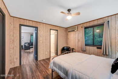 Discover the perfect blend of comfort and serenity in this on The Hideout Golf in Pennsylvania - for sale on GolfHomes.com, golf home, golf lot