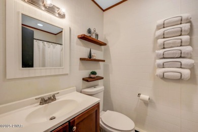 Discover the perfect blend of comfort and serenity in this on The Hideout Golf in Pennsylvania - for sale on GolfHomes.com, golf home, golf lot