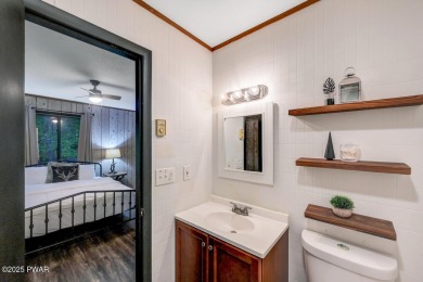 Discover the perfect blend of comfort and serenity in this on The Hideout Golf in Pennsylvania - for sale on GolfHomes.com, golf home, golf lot