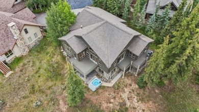 Pair mountain vistas with golf course tranquility in this on Keystone Ranch Golf Course in Colorado - for sale on GolfHomes.com, golf home, golf lot