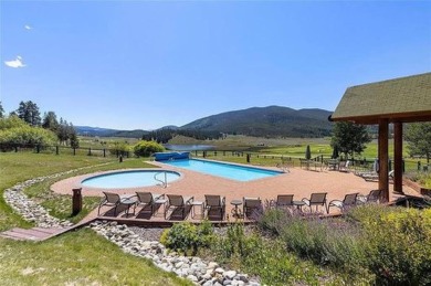 Pair mountain vistas with golf course tranquility in this on Keystone Ranch Golf Course in Colorado - for sale on GolfHomes.com, golf home, golf lot