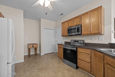 Welcome to Village Green at Brandywine Bay! This thoughtfully on Brandywine Bay Golf Club in North Carolina - for sale on GolfHomes.com, golf home, golf lot