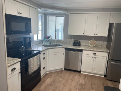TIRED OF SNOW,ICE AND COLD, TRADE IT IN FOR SUN,WARM AND WHITE on Pine Lakes Country Club in Florida - for sale on GolfHomes.com, golf home, golf lot