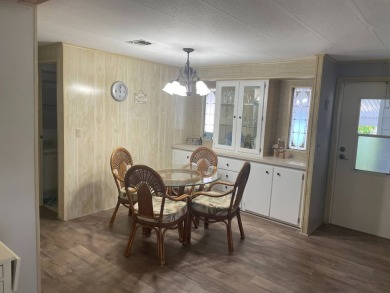 TIRED OF SNOW,ICE AND COLD, TRADE IT IN FOR SUN,WARM AND WHITE on Pine Lakes Country Club in Florida - for sale on GolfHomes.com, golf home, golf lot