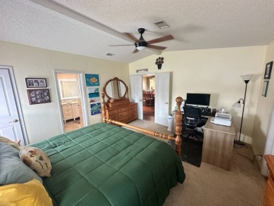 Lot Rent $1342.00 monthly  Beautiful stucco home located on a on Del Tura Golf and Country Club in Florida - for sale on GolfHomes.com, golf home, golf lot