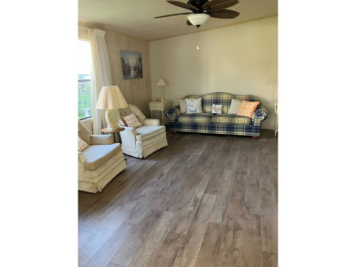 TIRED OF SNOW,ICE AND COLD, TRADE IT IN FOR SUN,WARM AND WHITE on Pine Lakes Country Club in Florida - for sale on GolfHomes.com, golf home, golf lot