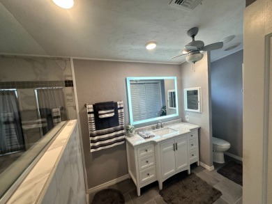 Lot Rent $1342.00 monthly  Beautiful stucco home located on a on Del Tura Golf and Country Club in Florida - for sale on GolfHomes.com, golf home, golf lot