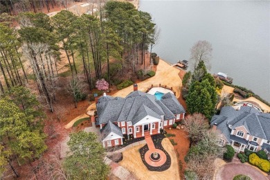 Elegant estate on the best lot in Windward. Privacy, peace, and on The Golf Club of Georgia in Georgia - for sale on GolfHomes.com, golf home, golf lot