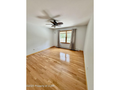 Custom-Built Home with Golf Course Views in Eagle Rock on Eagle Rock Golf and Ski Resort in Pennsylvania - for sale on GolfHomes.com, golf home, golf lot