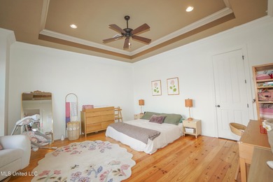 This stunning Lake Caroline waterfront home offers the perfect on Lake Caroline Golf Club in Mississippi - for sale on GolfHomes.com, golf home, golf lot