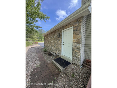 Custom-Built Home with Golf Course Views in Eagle Rock on Eagle Rock Golf and Ski Resort in Pennsylvania - for sale on GolfHomes.com, golf home, golf lot