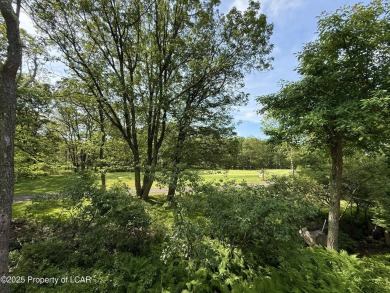 Custom-Built Home with Golf Course Views in Eagle Rock on Eagle Rock Golf and Ski Resort in Pennsylvania - for sale on GolfHomes.com, golf home, golf lot