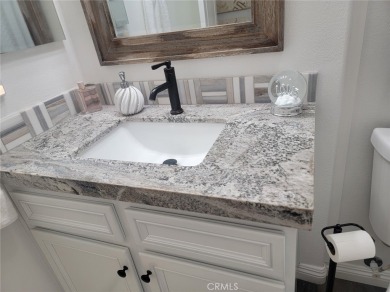 This beautiful KHovnanian built home has been recently updated on Hemet Golf Club in California - for sale on GolfHomes.com, golf home, golf lot