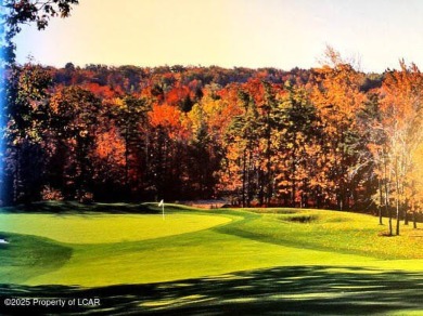 Custom-Built Home with Golf Course Views in Eagle Rock on Eagle Rock Golf and Ski Resort in Pennsylvania - for sale on GolfHomes.com, golf home, golf lot