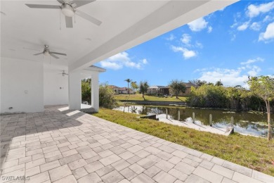 WATERFRONT NEW CONSTRUCTION HOME comes loaded with upgrades on Coral Oaks Golf Course in Florida - for sale on GolfHomes.com, golf home, golf lot