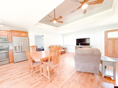 Just steps from the White River, this custom-built 2-bedroom on Rivercliff Golf Course in Arkansas - for sale on GolfHomes.com, golf home, golf lot