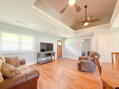 Just steps from the White River, this custom-built 2-bedroom on Rivercliff Golf Course in Arkansas - for sale on GolfHomes.com, golf home, golf lot