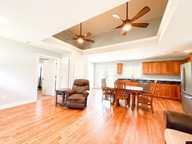 Just steps from the White River, this custom-built 2-bedroom on Rivercliff Golf Course in Arkansas - for sale on GolfHomes.com, golf home, golf lot