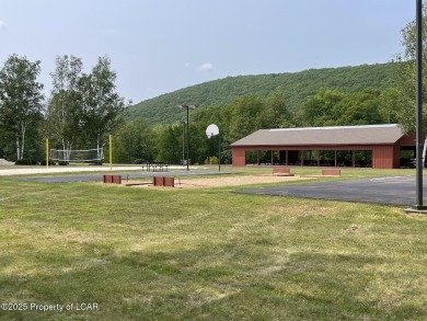 Custom-Built Home with Golf Course Views in Eagle Rock on Eagle Rock Golf and Ski Resort in Pennsylvania - for sale on GolfHomes.com, golf home, golf lot