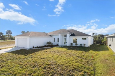 WATERFRONT NEW CONSTRUCTION HOME comes loaded with upgrades on Coral Oaks Golf Course in Florida - for sale on GolfHomes.com, golf home, golf lot