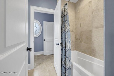 The approach to 2304 Ocean Ridge Place begins along one of on Country Club of Landfall in North Carolina - for sale on GolfHomes.com, golf home, golf lot