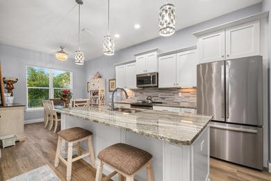 Welcome to this modern 3-bed, 2-bath CBS home in desirable Sun on Sun n Lake Golf and Country Club in Florida - for sale on GolfHomes.com, golf home, golf lot