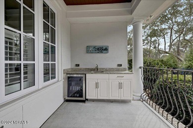 The approach to 2304 Ocean Ridge Place begins along one of on Country Club of Landfall in North Carolina - for sale on GolfHomes.com, golf home, golf lot