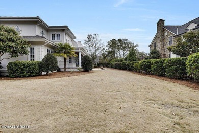 The approach to 2304 Ocean Ridge Place begins along one of on Country Club of Landfall in North Carolina - for sale on GolfHomes.com, golf home, golf lot