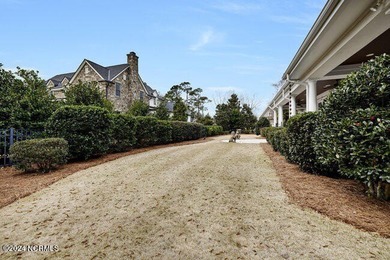 The approach to 2304 Ocean Ridge Place begins along one of on Country Club of Landfall in North Carolina - for sale on GolfHomes.com, golf home, golf lot