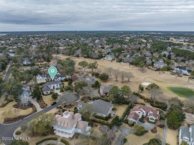 The approach to 2304 Ocean Ridge Place begins along one of on Country Club of Landfall in North Carolina - for sale on GolfHomes.com, golf home, golf lot