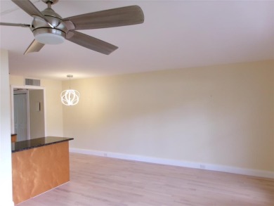This is a stunning 1 bedroom 1.5 bath unit located on the first on Wynmoor Golf Course in Florida - for sale on GolfHomes.com, golf home, golf lot
