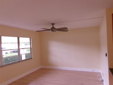 This is a stunning 1 bedroom 1.5 bath unit located on the first on Wynmoor Golf Course in Florida - for sale on GolfHomes.com, golf home, golf lot