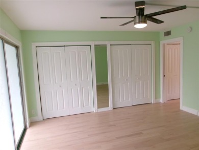 This is a stunning 1 bedroom 1.5 bath unit located on the first on Wynmoor Golf Course in Florida - for sale on GolfHomes.com, golf home, golf lot