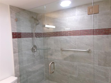 This is a stunning 1 bedroom 1.5 bath unit located on the first on Wynmoor Golf Course in Florida - for sale on GolfHomes.com, golf home, golf lot