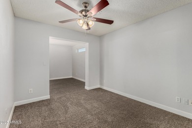 Golf Course 3 bedroom, 2 bath home with bonus room in Peoria! on Country Meadows Golf Club in Arizona - for sale on GolfHomes.com, golf home, golf lot