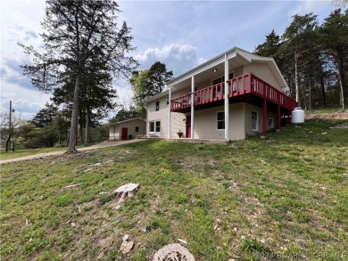 Updated two story home located next to Old Kinderhook golf on The Club At Old Kinderhook in Missouri - for sale on GolfHomes.com, golf home, golf lot