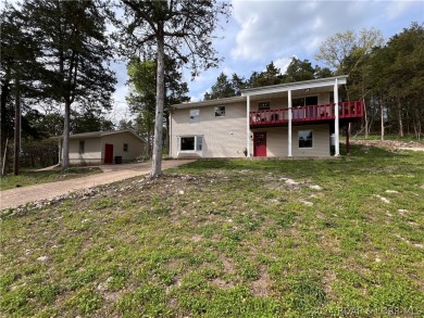 Updated two story home located next to Old Kinderhook golf on The Club At Old Kinderhook in Missouri - for sale on GolfHomes.com, golf home, golf lot