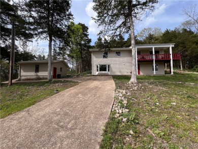 Updated two story home located next to Old Kinderhook golf on The Club At Old Kinderhook in Missouri - for sale on GolfHomes.com, golf home, golf lot