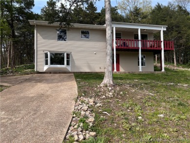 Updated two story home located next to Old Kinderhook golf on The Club At Old Kinderhook in Missouri - for sale on GolfHomes.com, golf home, golf lot