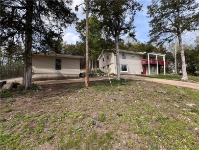 Updated two story home located next to Old Kinderhook golf on The Club At Old Kinderhook in Missouri - for sale on GolfHomes.com, golf home, golf lot