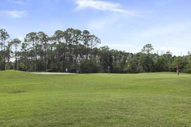 Experience luxury living in this desirable ground-floor Golf on Regatta Bay Golf and Country Club in Florida - for sale on GolfHomes.com, golf home, golf lot