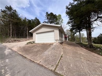 Updated two story home located next to Old Kinderhook golf on The Club At Old Kinderhook in Missouri - for sale on GolfHomes.com, golf home, golf lot