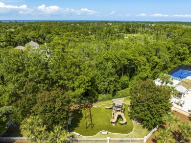 Experience luxury living in this desirable ground-floor Golf on Regatta Bay Golf and Country Club in Florida - for sale on GolfHomes.com, golf home, golf lot