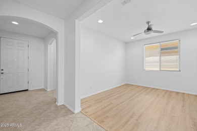 Embrace the vibrant Active Adult lifestyle in this beautifully on Poston Butte Golf Club in Arizona - for sale on GolfHomes.com, golf home, golf lot