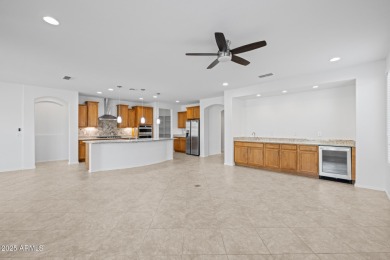 Embrace the vibrant Active Adult lifestyle in this beautifully on Poston Butte Golf Club in Arizona - for sale on GolfHomes.com, golf home, golf lot