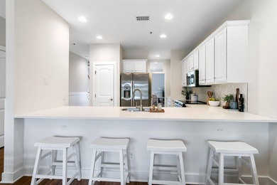 Enjoy $70K+ of recent upgrades in this bright, airy townhome on Charleston National Golf Club in South Carolina - for sale on GolfHomes.com, golf home, golf lot