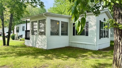 Enjoy beautiful Fish Hook Lake without the work! Well maintained on Headwaters Country Club in Minnesota - for sale on GolfHomes.com, golf home, golf lot