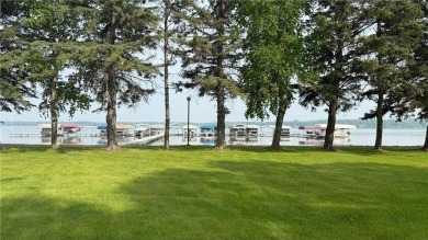 Enjoy beautiful Fish Hook Lake without the work! Well maintained on Headwaters Country Club in Minnesota - for sale on GolfHomes.com, golf home, golf lot