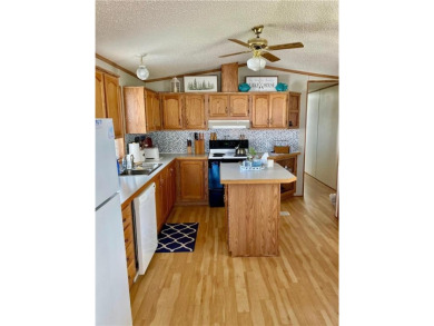 Enjoy beautiful Fish Hook Lake without the work! Well maintained on Headwaters Country Club in Minnesota - for sale on GolfHomes.com, golf home, golf lot