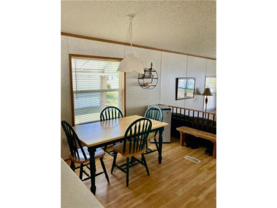 Enjoy beautiful Fish Hook Lake without the work! Well maintained on Headwaters Country Club in Minnesota - for sale on GolfHomes.com, golf home, golf lot